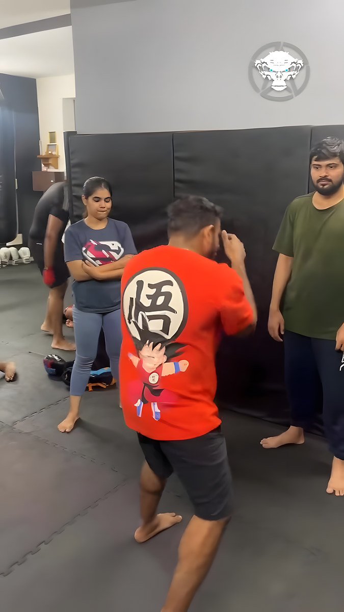 Members drilling in pairs during a class