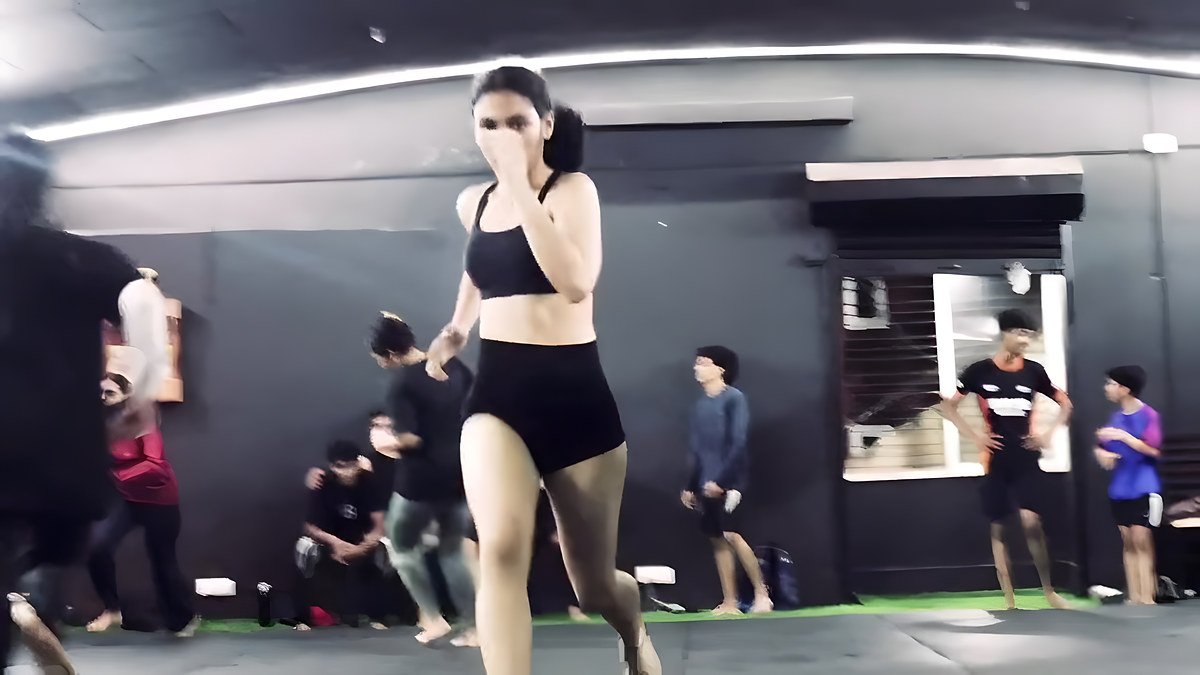 A member mid-session on the gym floor